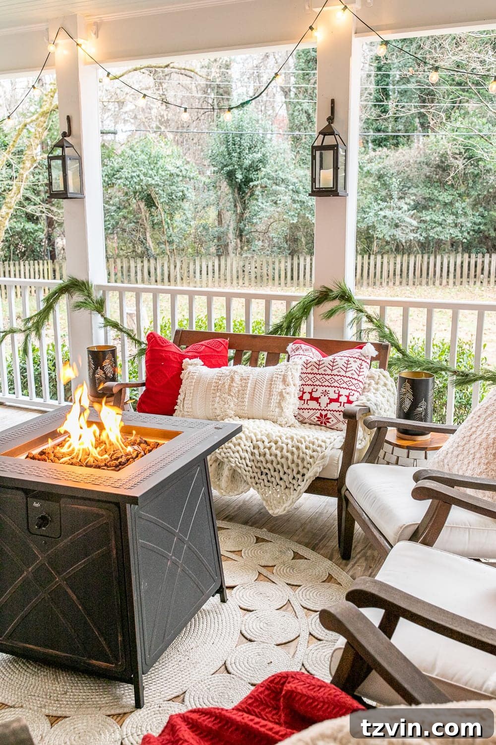 Beautiful fresh Christmas garland hanging on a porch, exuding natural holiday charm