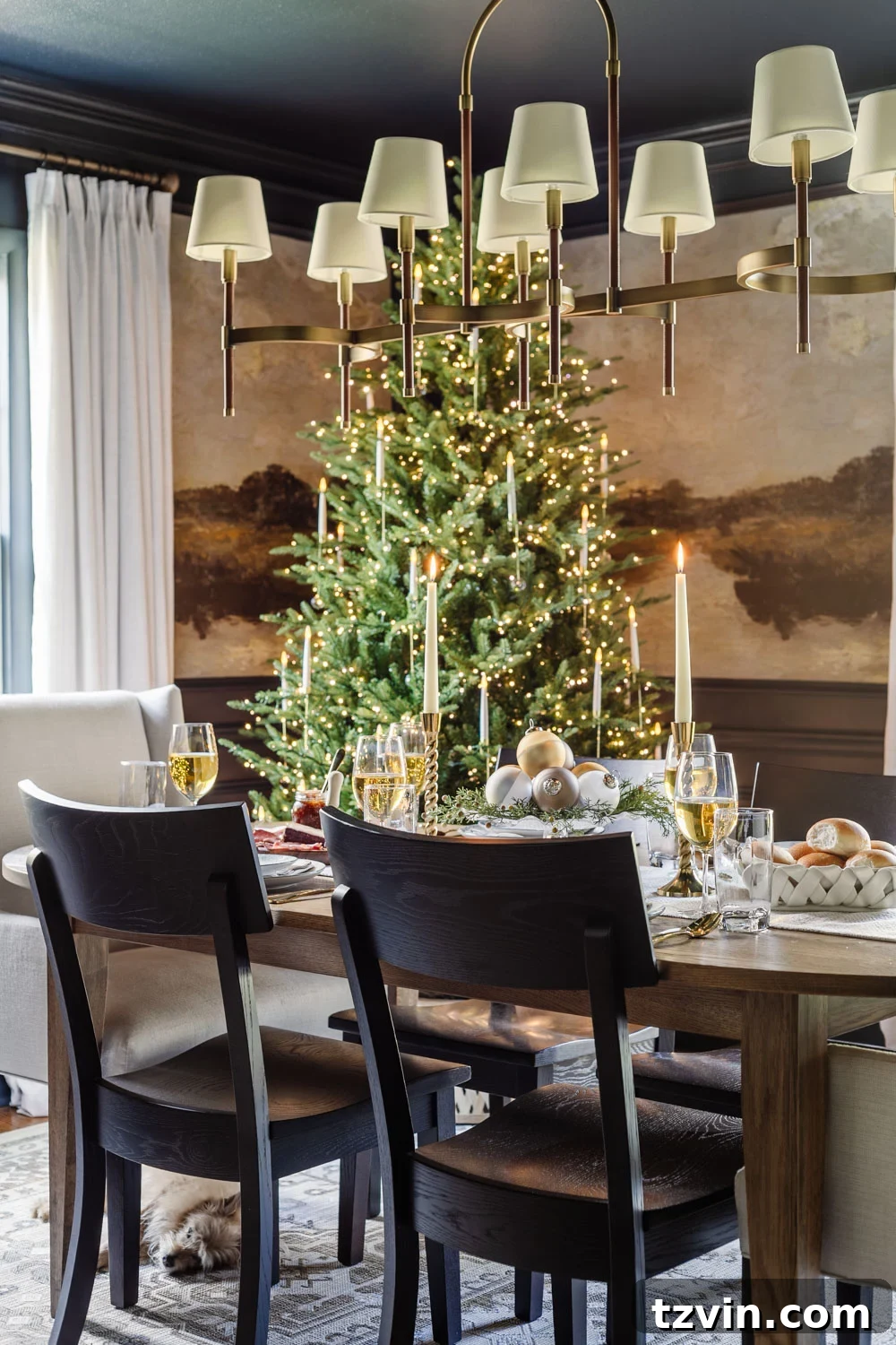 Christmas dining room decor with tree beside table