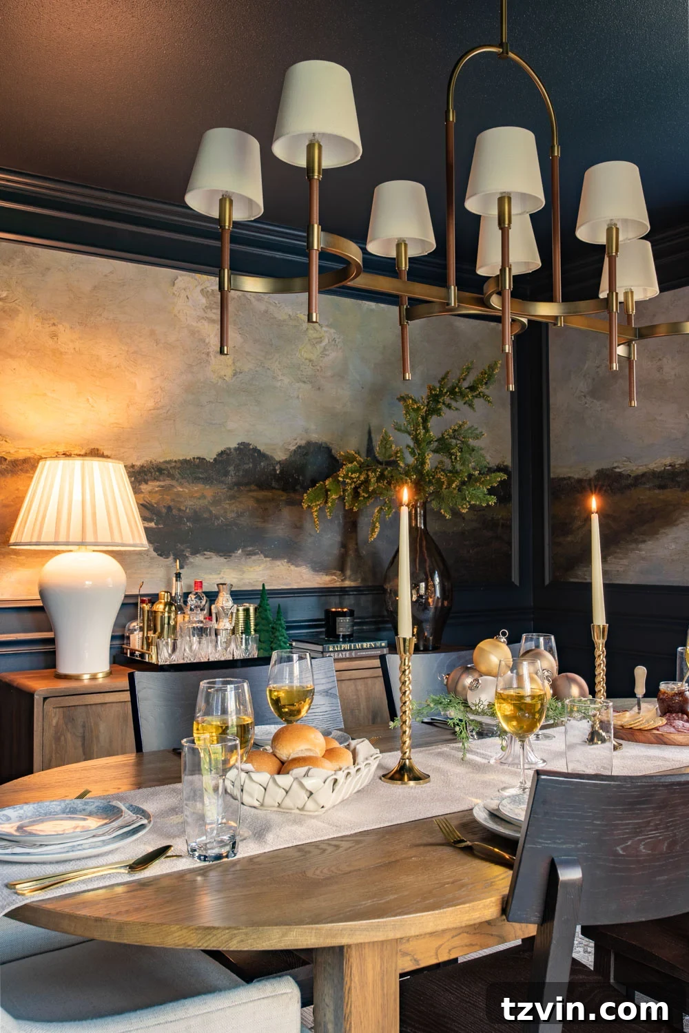 navy blue dining room decorated for Christmas with mural walls