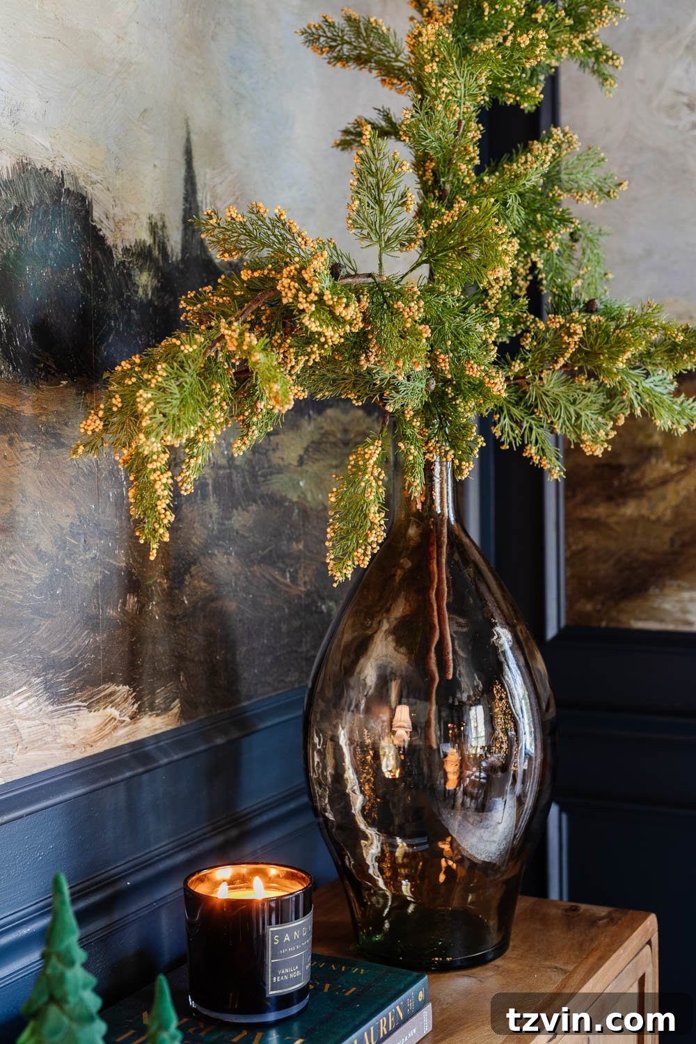 vase of Christmas greenery on dining room sideboard
