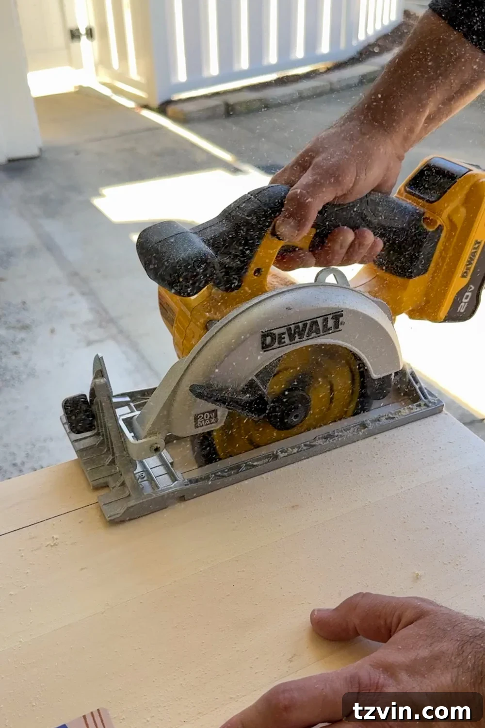 Classic Style DIY Fireplace Molding Transformation 16 Cutting plywood piece for fireplace trim with circular saw