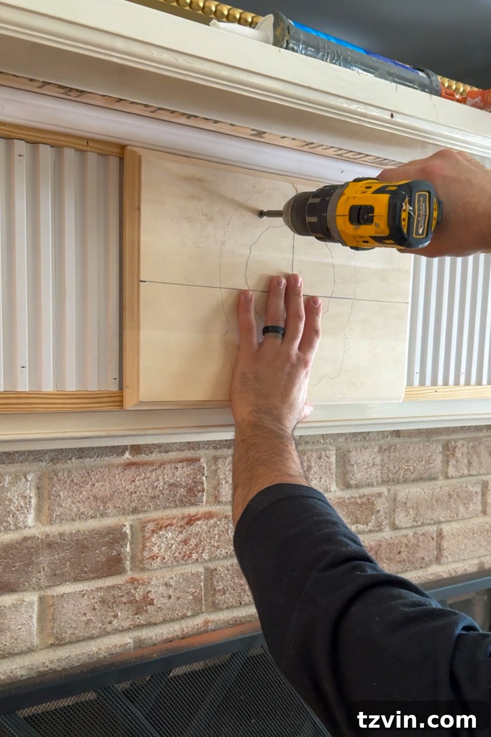 Classic Style DIY Fireplace Molding Transformation 18 Attaching overlay plinth to fireplace front
