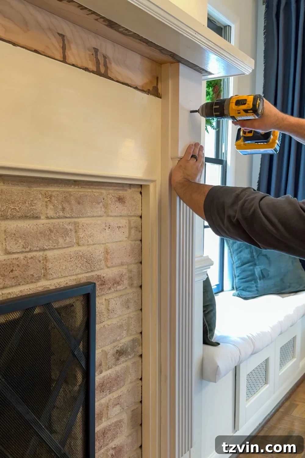 Classic Style DIY Fireplace Molding Transformation 8 Attaching the top section of Federal Colonial style molding to the fireplace