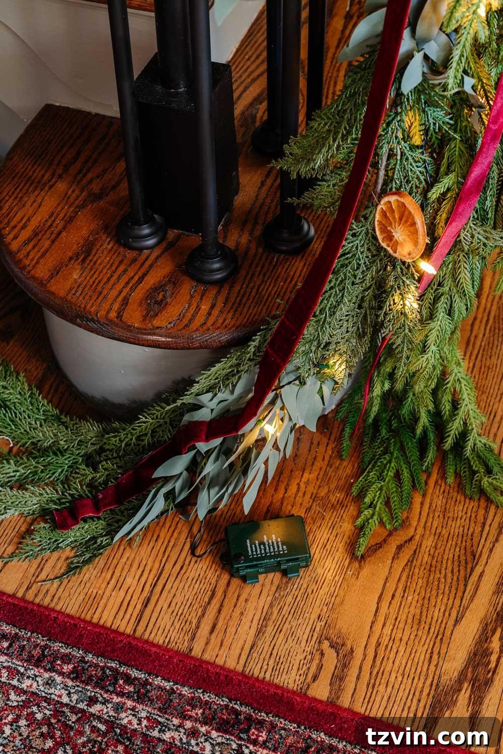 hiding battery pack of twinkle lights in garland