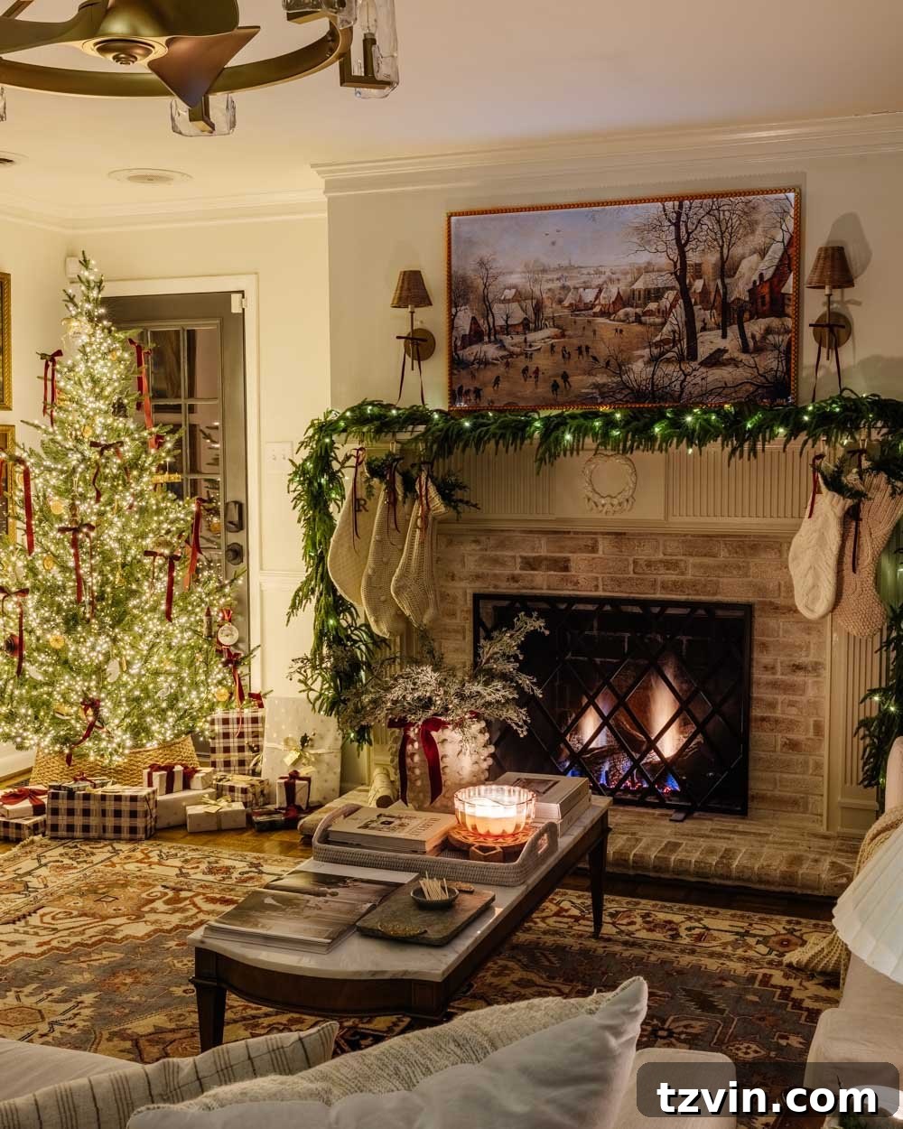 Living room decorated for Christmas with a traditional fireplace, enhanced by the soft glow of candles and tree lights.