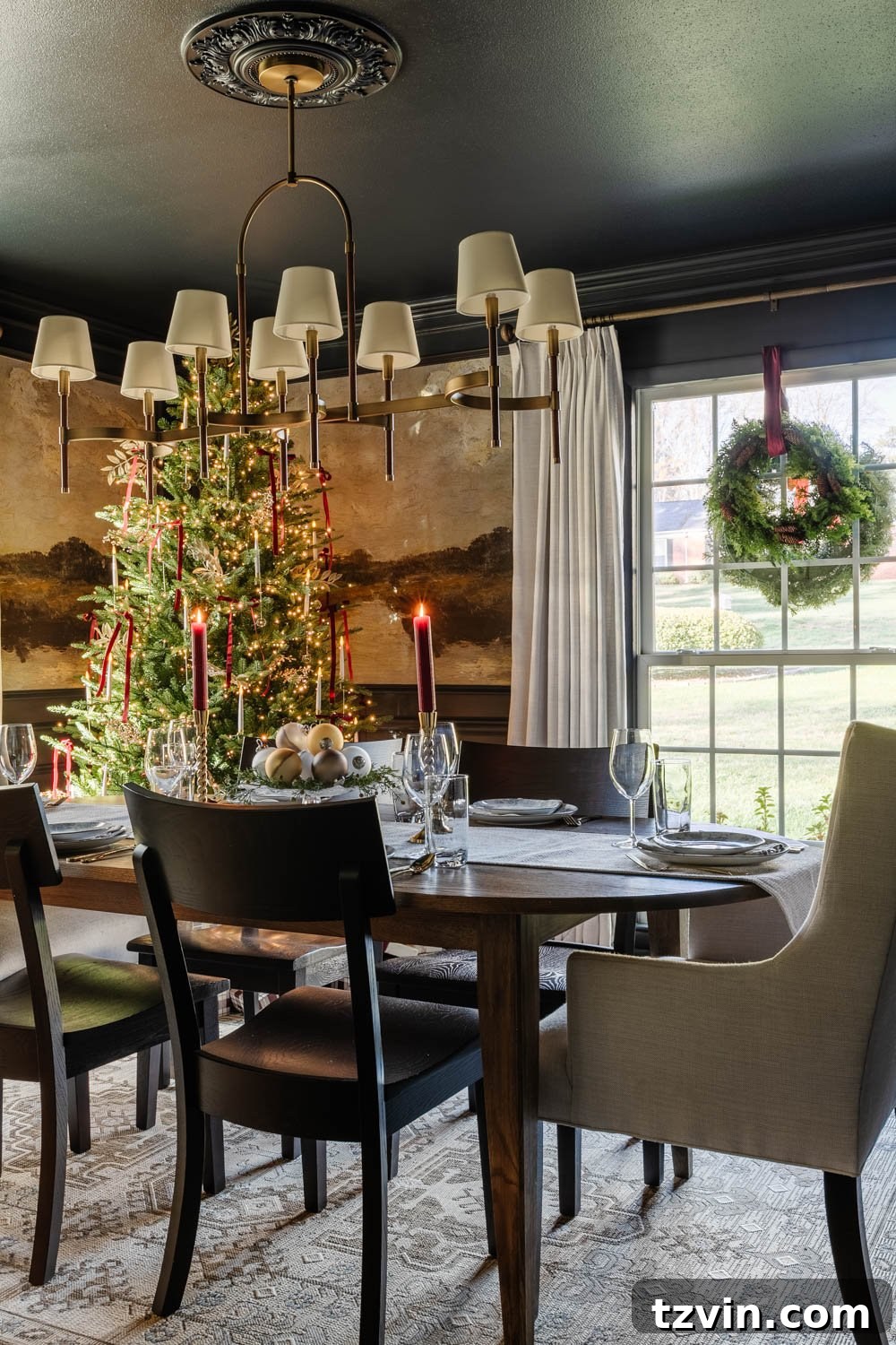 Luxurious modern traditional colonial Christmas dining room with a stunning mural wallpaper, elegant furniture, and festive table decor.