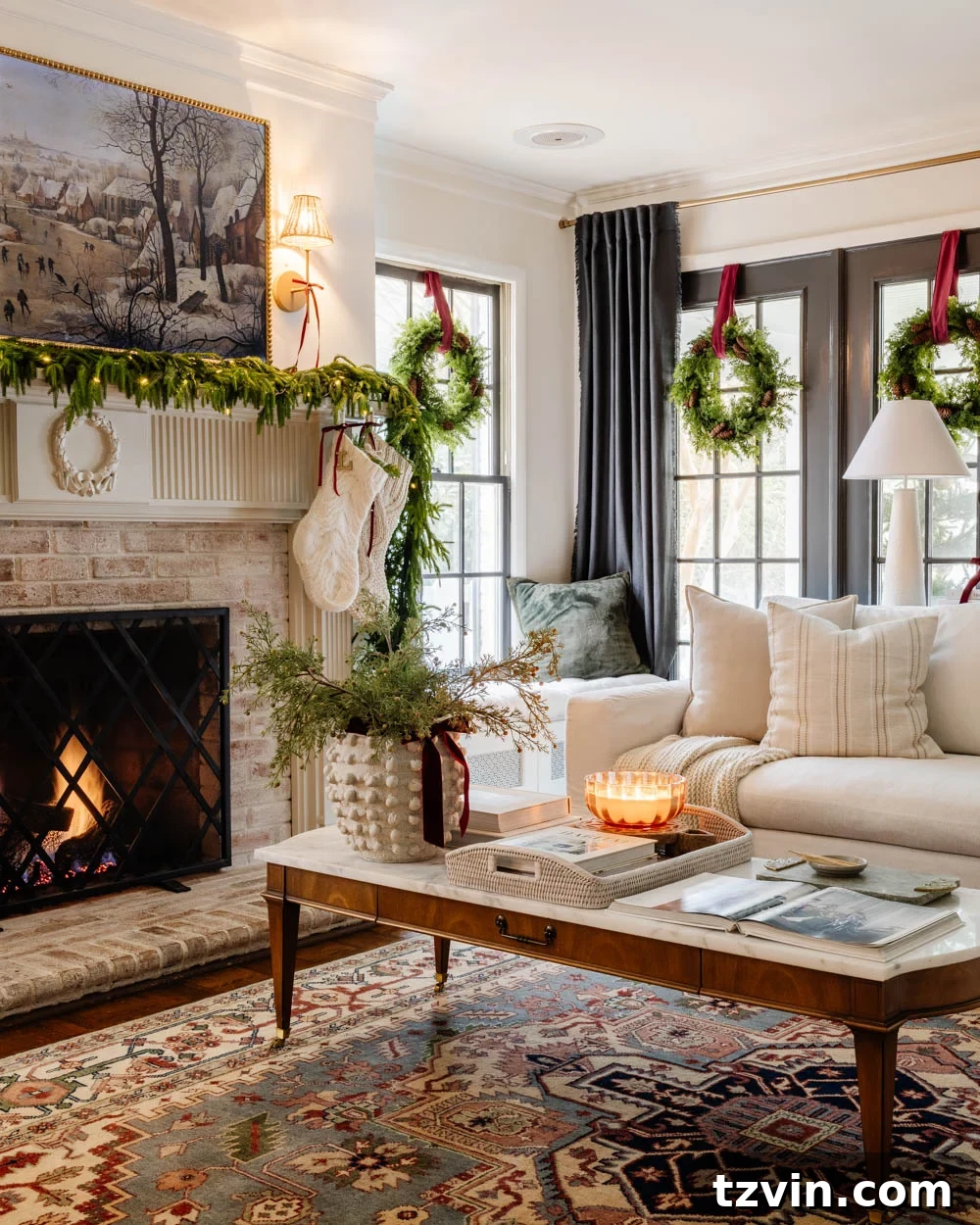 Close-up of a festive Christmas tree with soft lights and traditional ornaments in a modern colonial living room setting.