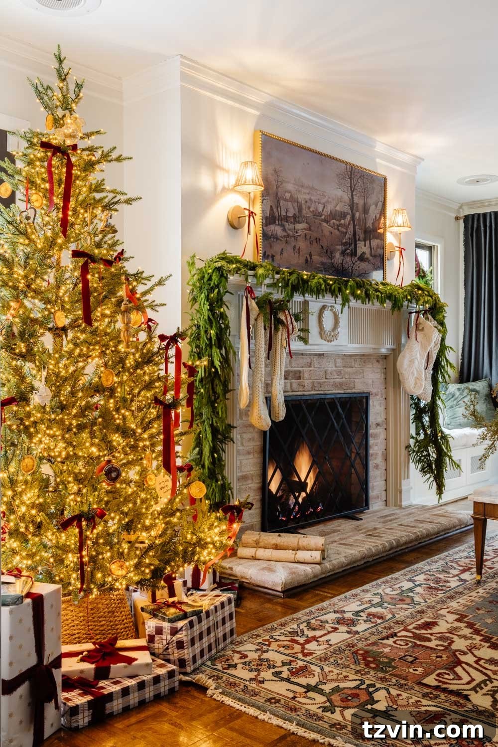 Detail shot of festive decorations on a console table in a modern colonial living room, featuring holiday greenery and subtle lighting.