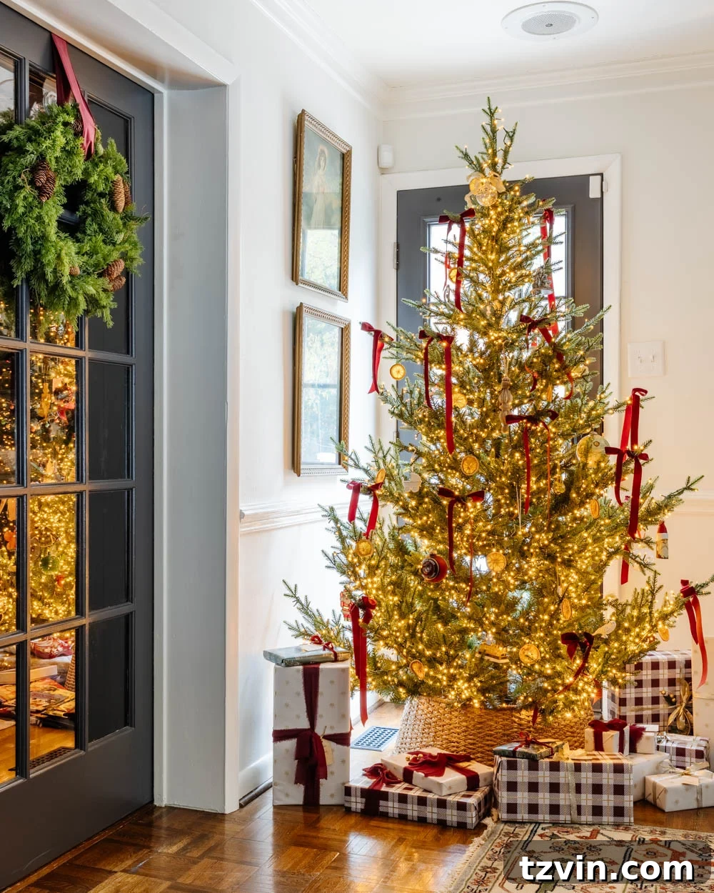 Bright and festive modern traditional colonial Christmas living room, adorned with twinkling lights and classic holiday elements.