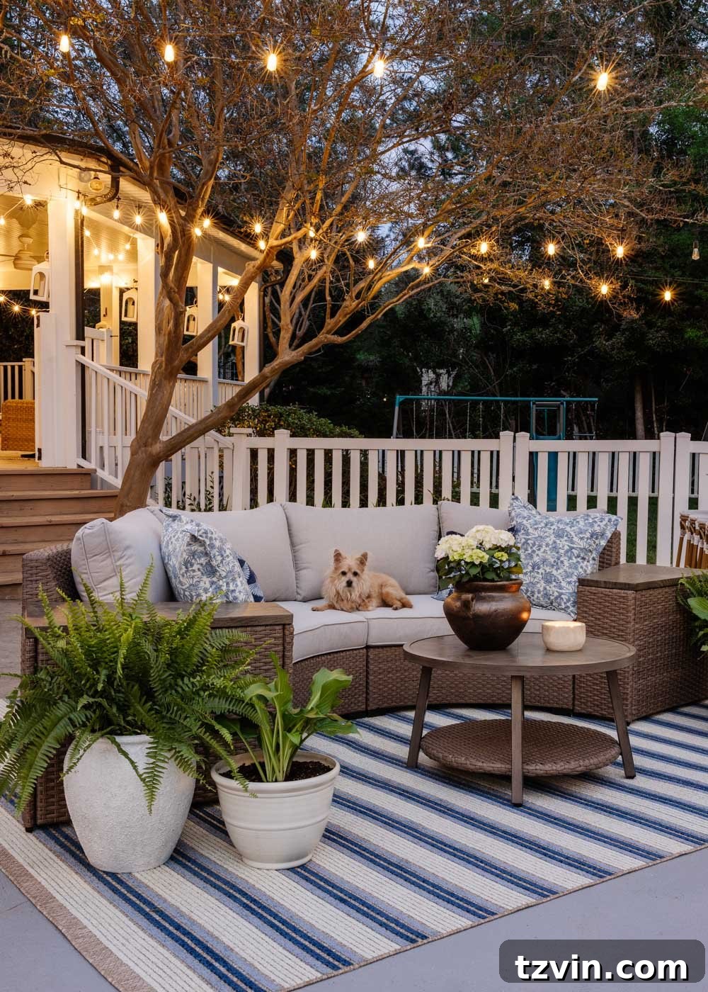 Savvy Buys for Your Outdoor Sanctuary 2 Designer look for less outdoor furniture from Lowe's, featuring a stylish patio setup with seating, a coffee table, and greenery.