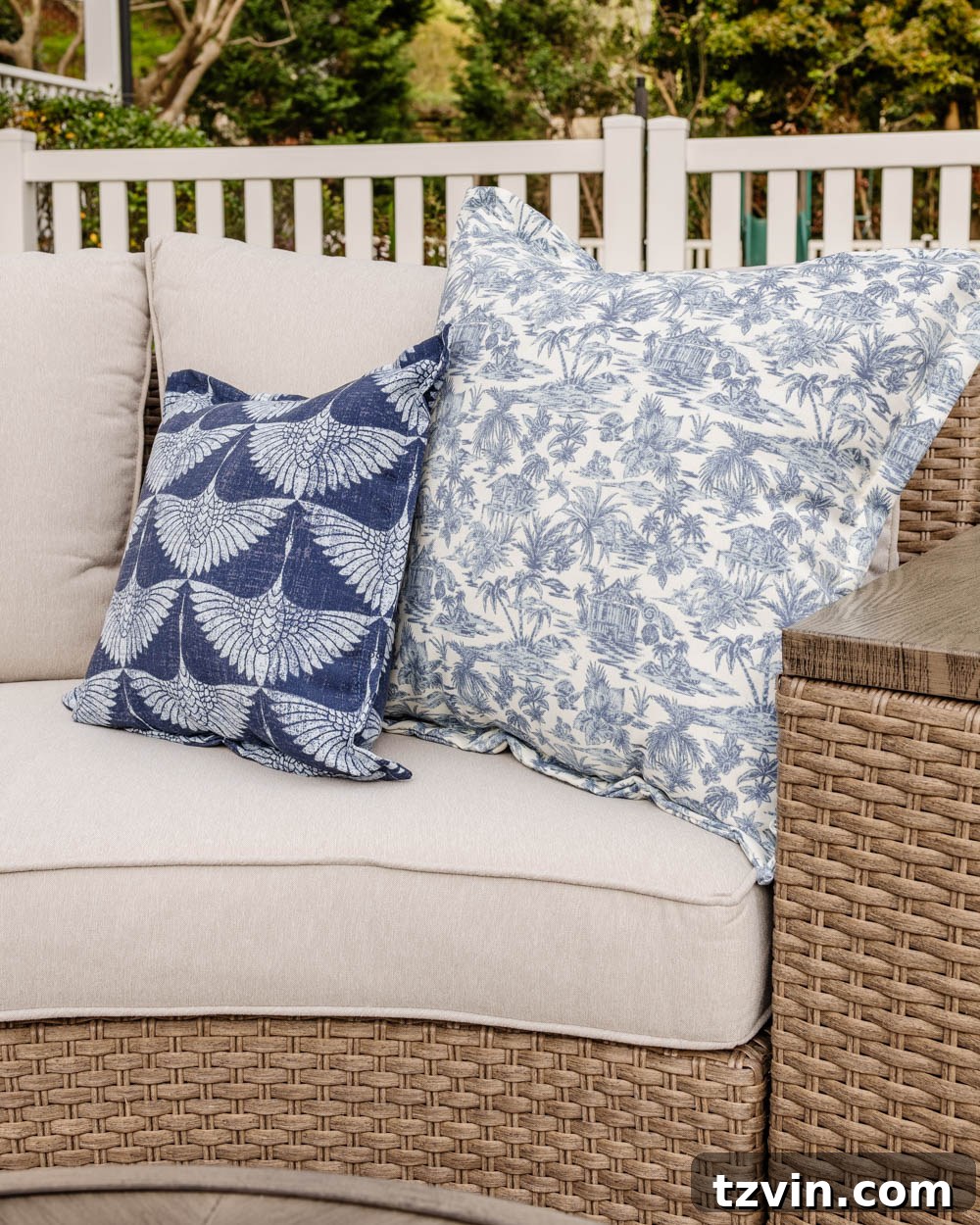 Savvy Buys for Your Outdoor Sanctuary 7 Close-up of a vibrant tropical toile outdoor pillow, showcasing intricate design and rich colors.