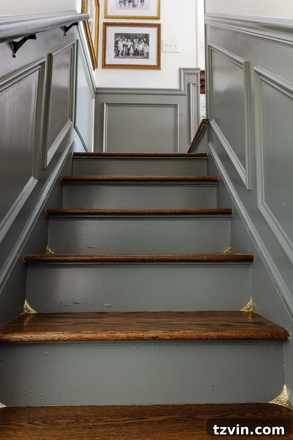 The Smart Way to Keep Your Stair Corners Dust-Free 5 Detailed shot of ornate Victorian brass dust corners on elegant wooden stairs