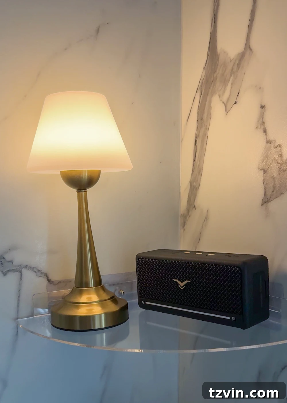The Coziest Shower Lights Trending Now 4 waterproof lamp on shower shelf with bluetooth speaker for a cozy bathroom