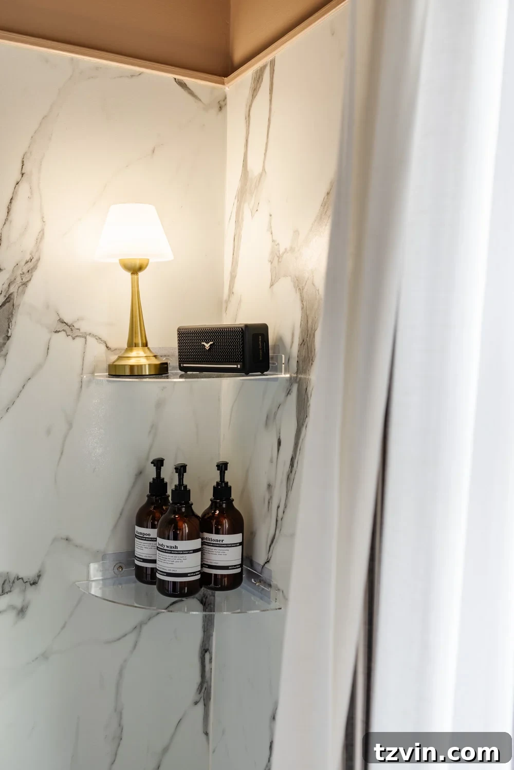 The Coziest Shower Lights Trending Now 5 waterproof lamp on shower shelf with bluetooth speaker for a cozy bathroom