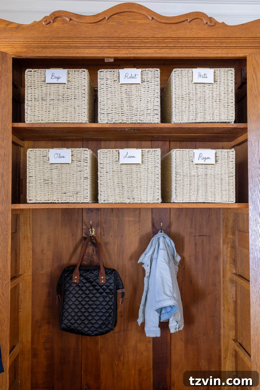 armoire coat closet in an entryway for storage without a mudroom