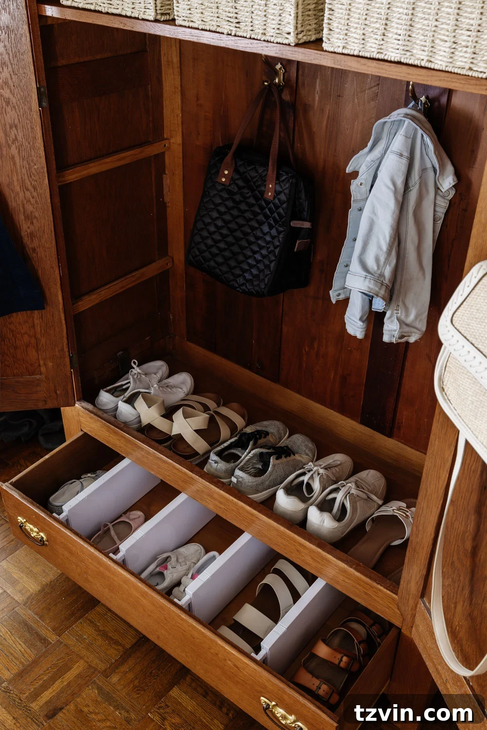 armoire coat closet in an entryway for storage without a mudroom