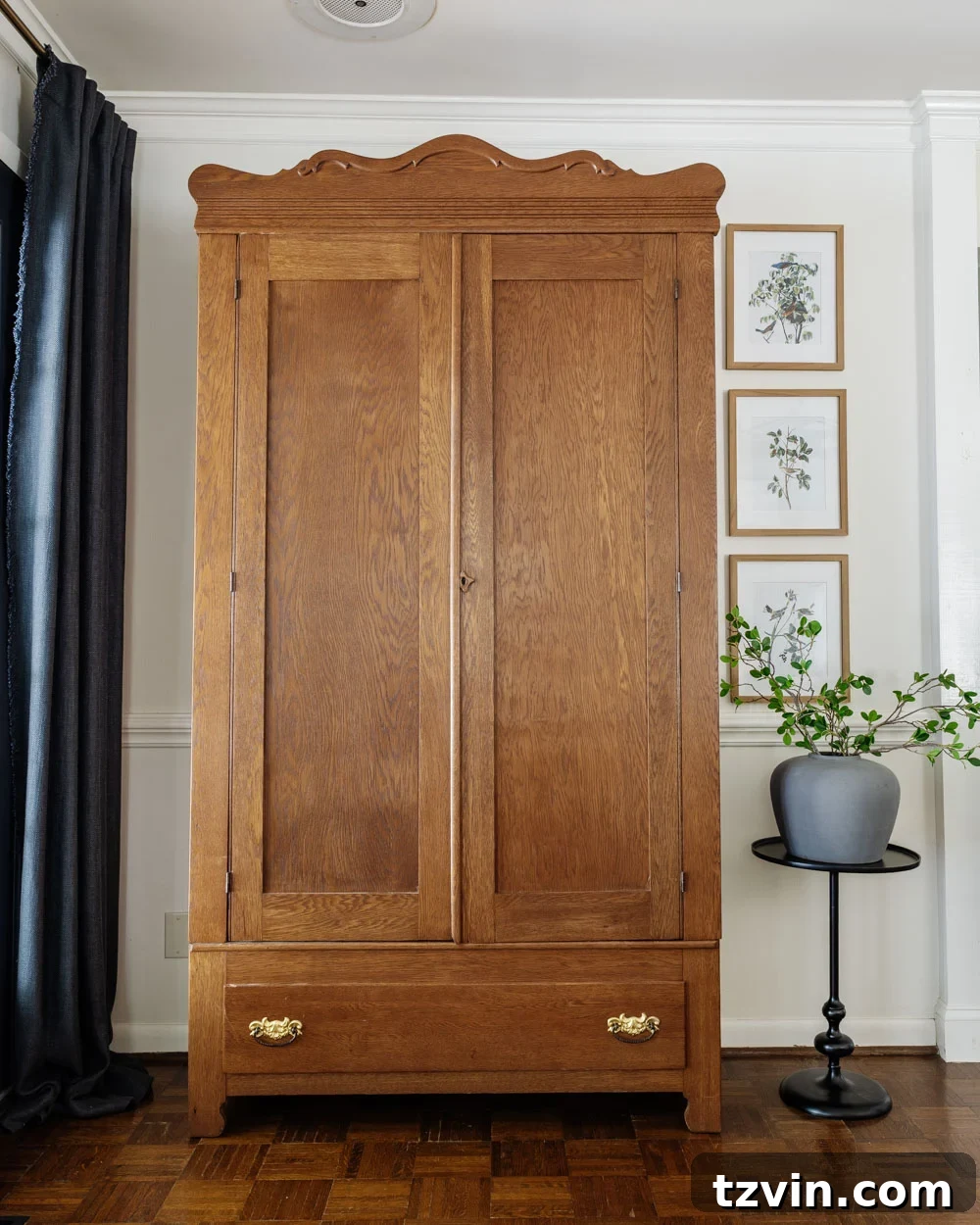 armoire coat closet in an entryway for storage without a mudroom
