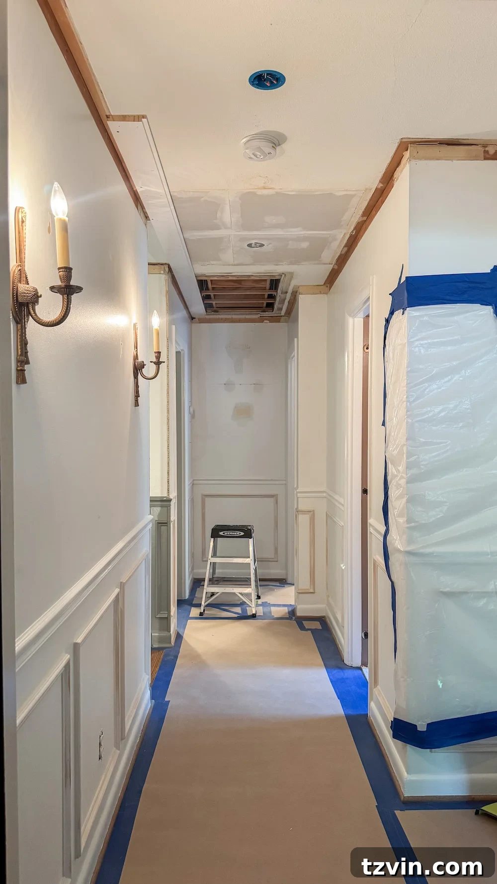 hide attic door with shiplap ceiling