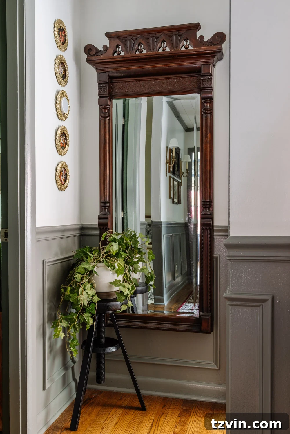 Design Hacks for Expansive Hallways 11 Vintage style sconces casting a soft glow in a hallway