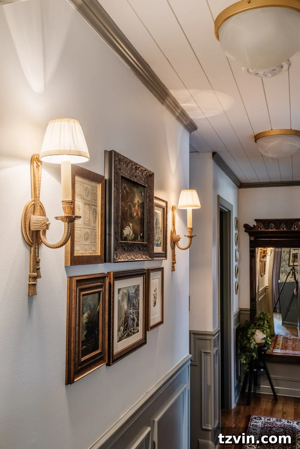 Design Hacks for Expansive Hallways 12 Gallery wall featuring public domain art in a narrow hallway