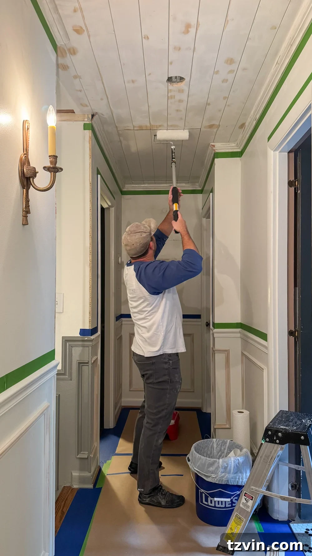 Design Hacks for Expansive Hallways 4 How to hide an attic door in the ceiling with tongue and groove shiplap