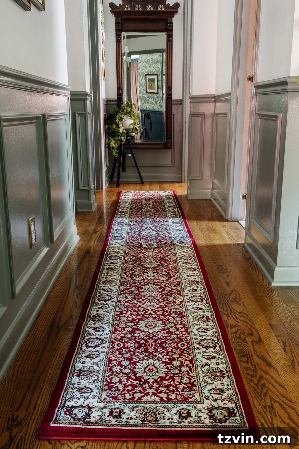 Design Hacks for Expansive Hallways 8 Faux eucalyptus tree in a modern white planter in a hallway corner