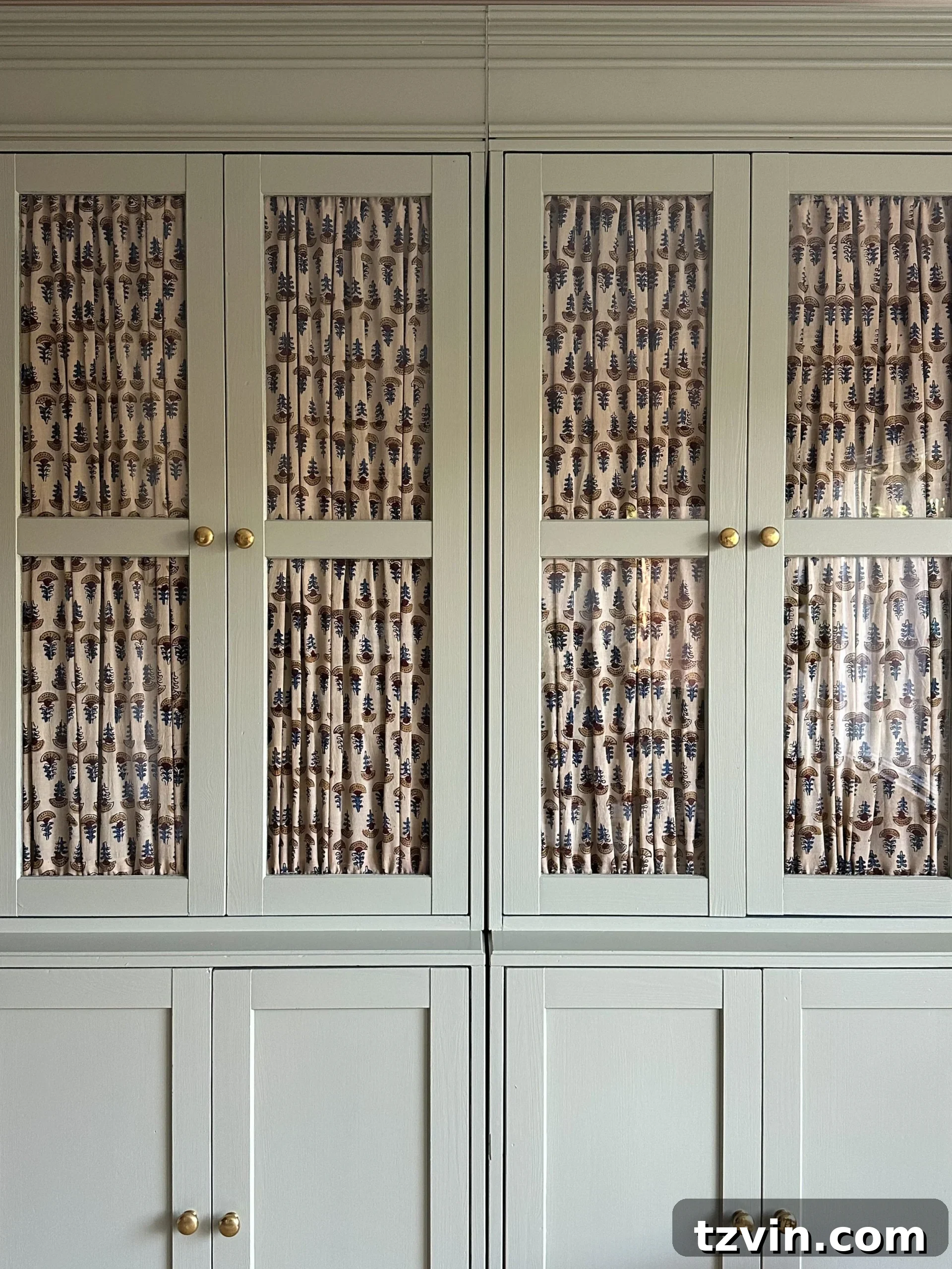 Expert IKEA Laundry Room Cabinet Planning Secrets 8 gathered fabric behind glass cabinet doors for a vintage look