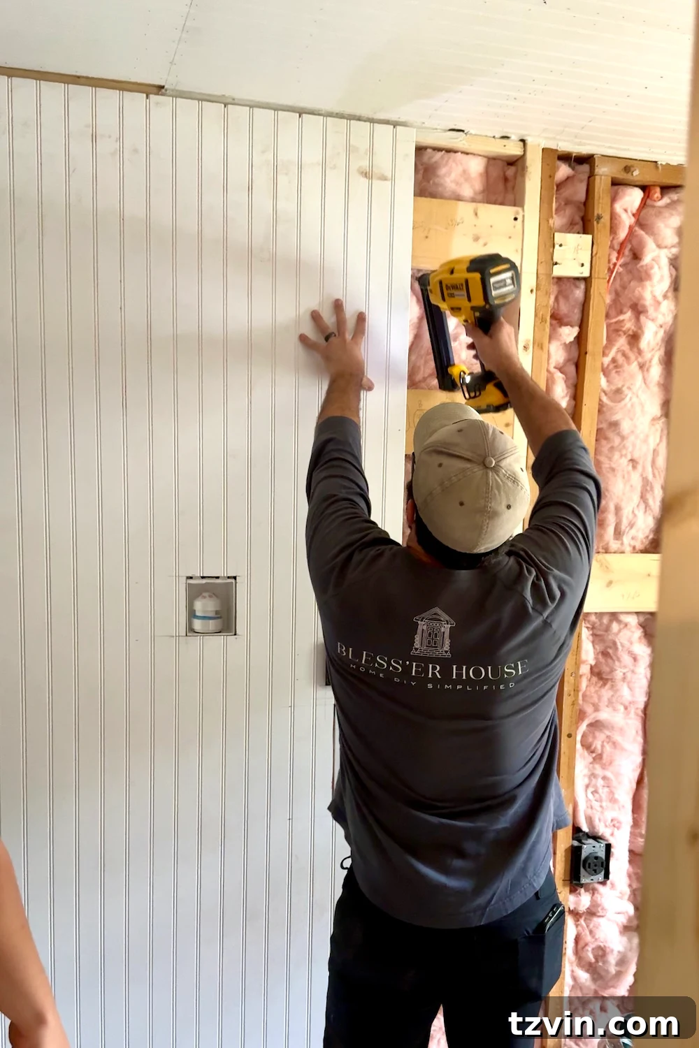 Marking stud locations on the wall before beadboard installation