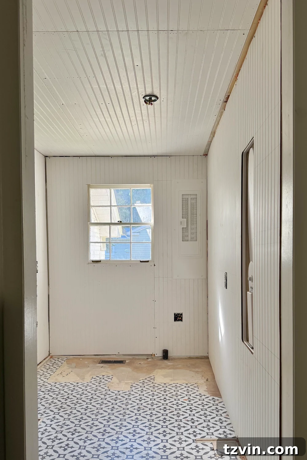 Caulking seams and filling nail holes on newly installed beadboard walls