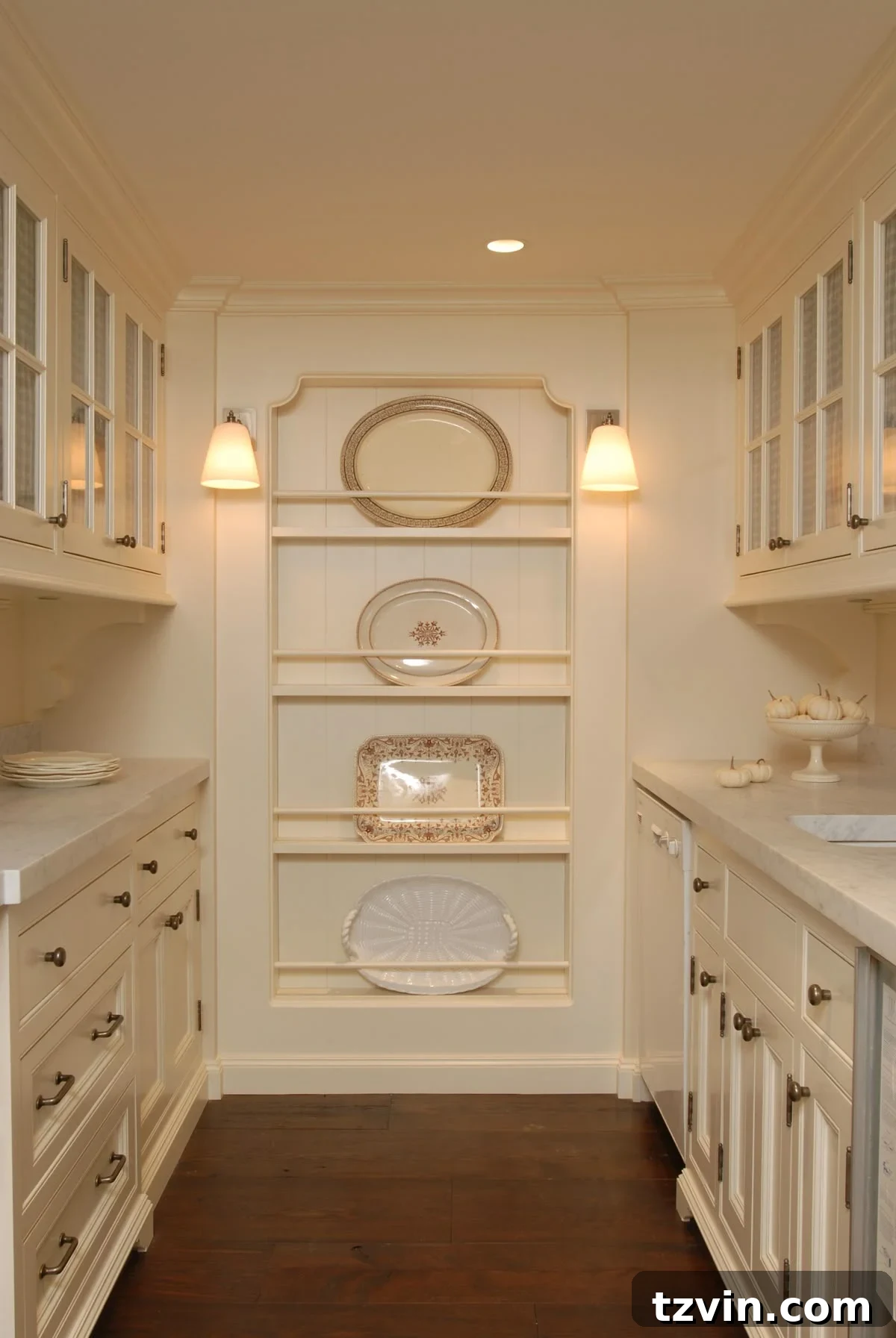 Decorative and functional recessed plate rack built into a kitchen wall.