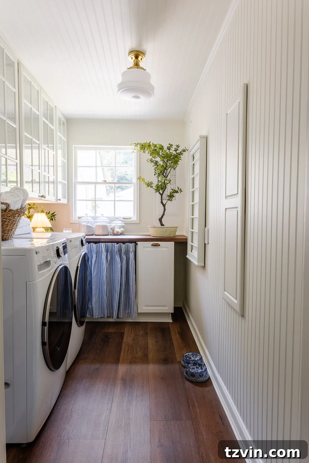 The Narrow Laundry Room: A Functional Powerhouse 2 narrow laundry room layout with IKEA cabinets with vintage Nancy Meyers style