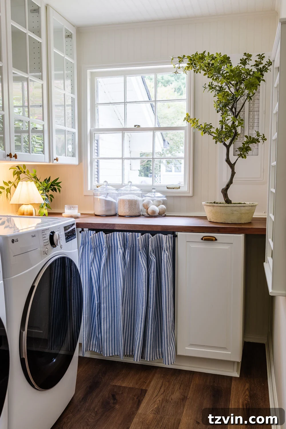 The Narrow Laundry Room: A Functional Powerhouse 7 narrow laundry room layout with IKEA cabinets with vintage Nancy Meyers style