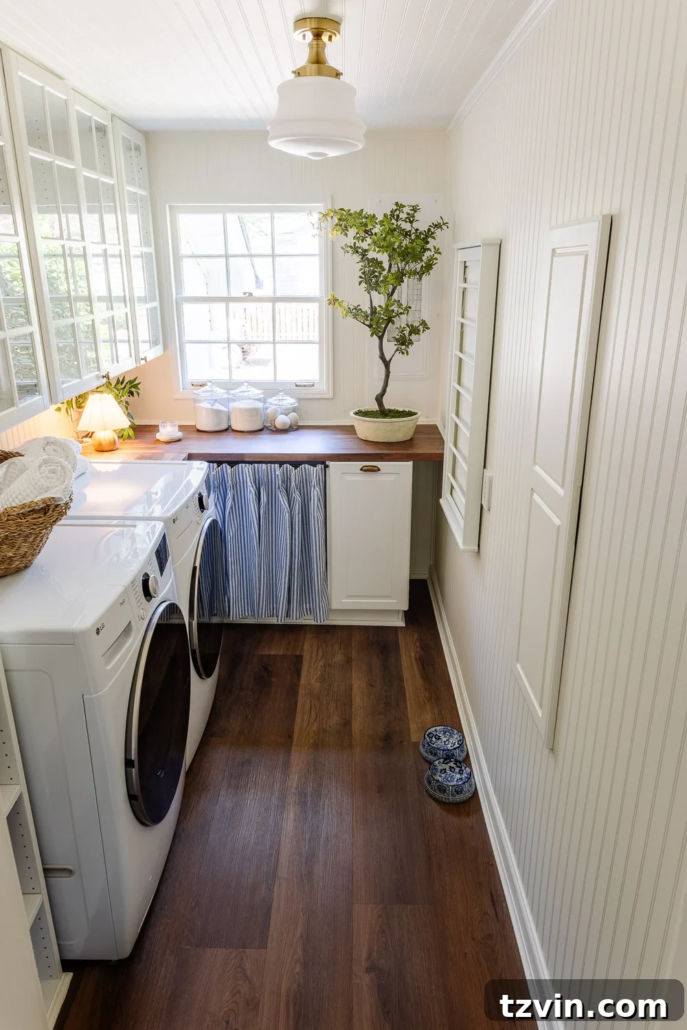 The Narrow Laundry Room: A Functional Powerhouse 8 narrow laundry room layout with IKEA cabinets with vintage Nancy Meyers style