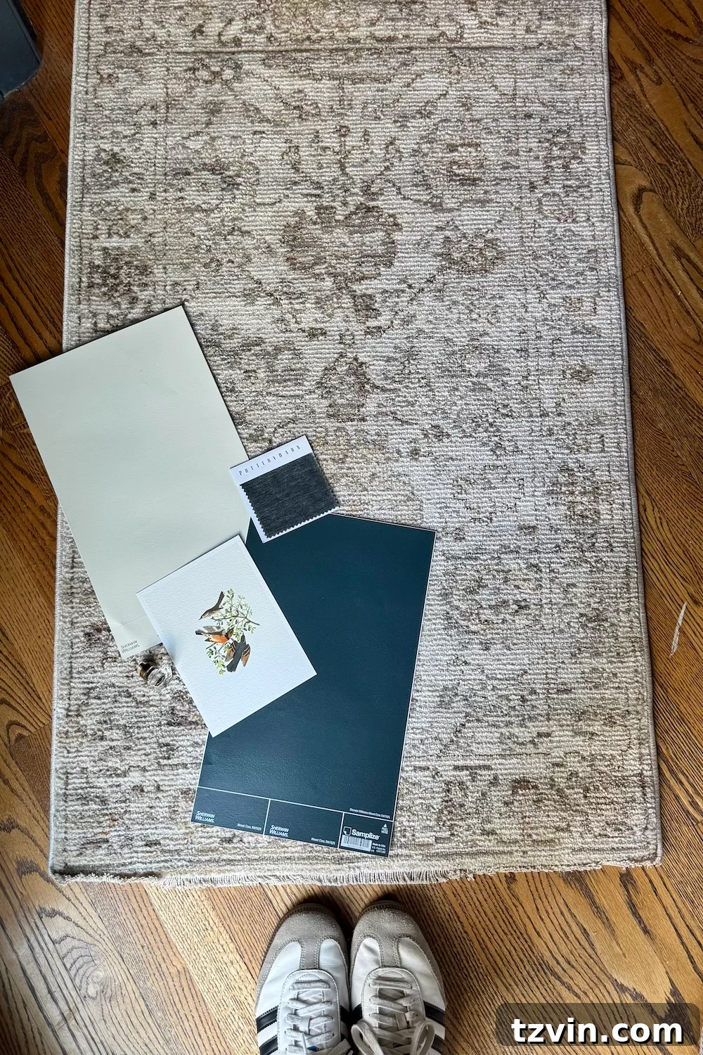 A mood board featuring various textures, colors, and inspirational images for cohesive home design.