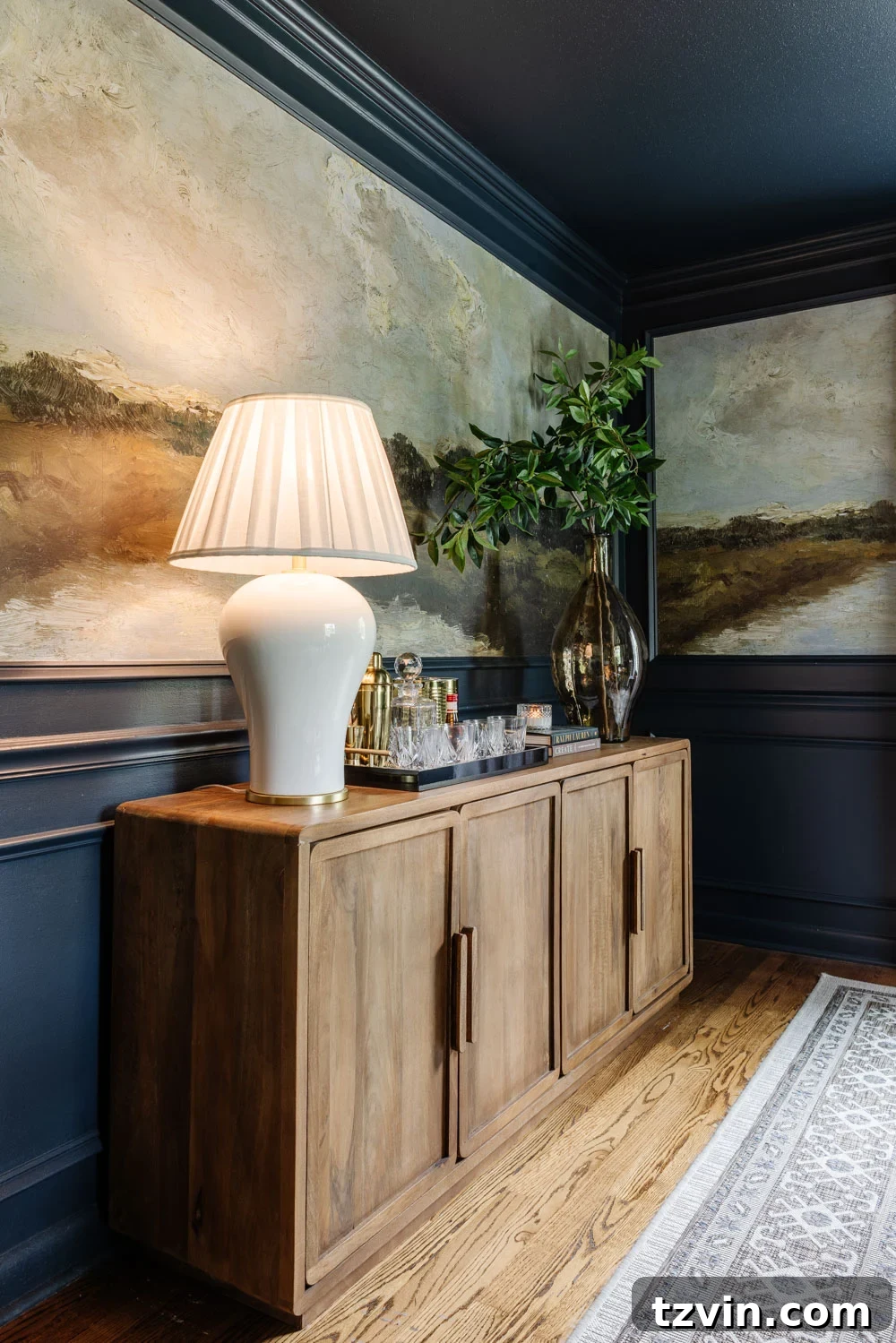 A dining room buffet decorated with cohesive accents, reflecting the overall home design.