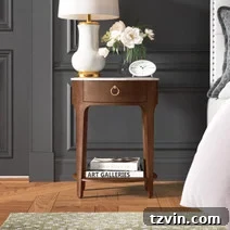 Tiny Bedroom Solutions: 20+ Space-Saving Nightstands 15 Sleek wooden slim bedside table with subtle drawer pulls, emphasizing minimalism for small spaces.