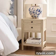 Tiny Bedroom Solutions: 20+ Space-Saving Nightstands 17 Modern black narrow nightstand with a geometric metal base, providing a chic solution for tight spaces.