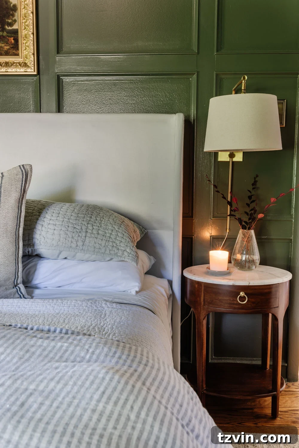 Tiny Bedroom Solutions: 20+ Space-Saving Nightstands 3 A beautifully styled slim bedside table with a lamp and minimal decor, showcasing practical solutions for tight bedroom spaces.