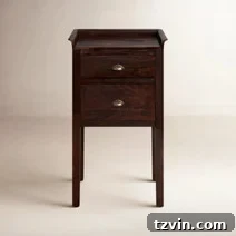 Tiny Bedroom Solutions: 20+ Space-Saving Nightstands 22 Elegant grey slim bedside table with a classic profile and subtle drawer pulls, fitting into various decor schemes.