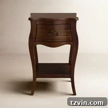 Tiny Bedroom Solutions: 20+ Space-Saving Nightstands 8 Classic white narrow bedside table with two drawers and clean lines, a versatile choice for any decor.