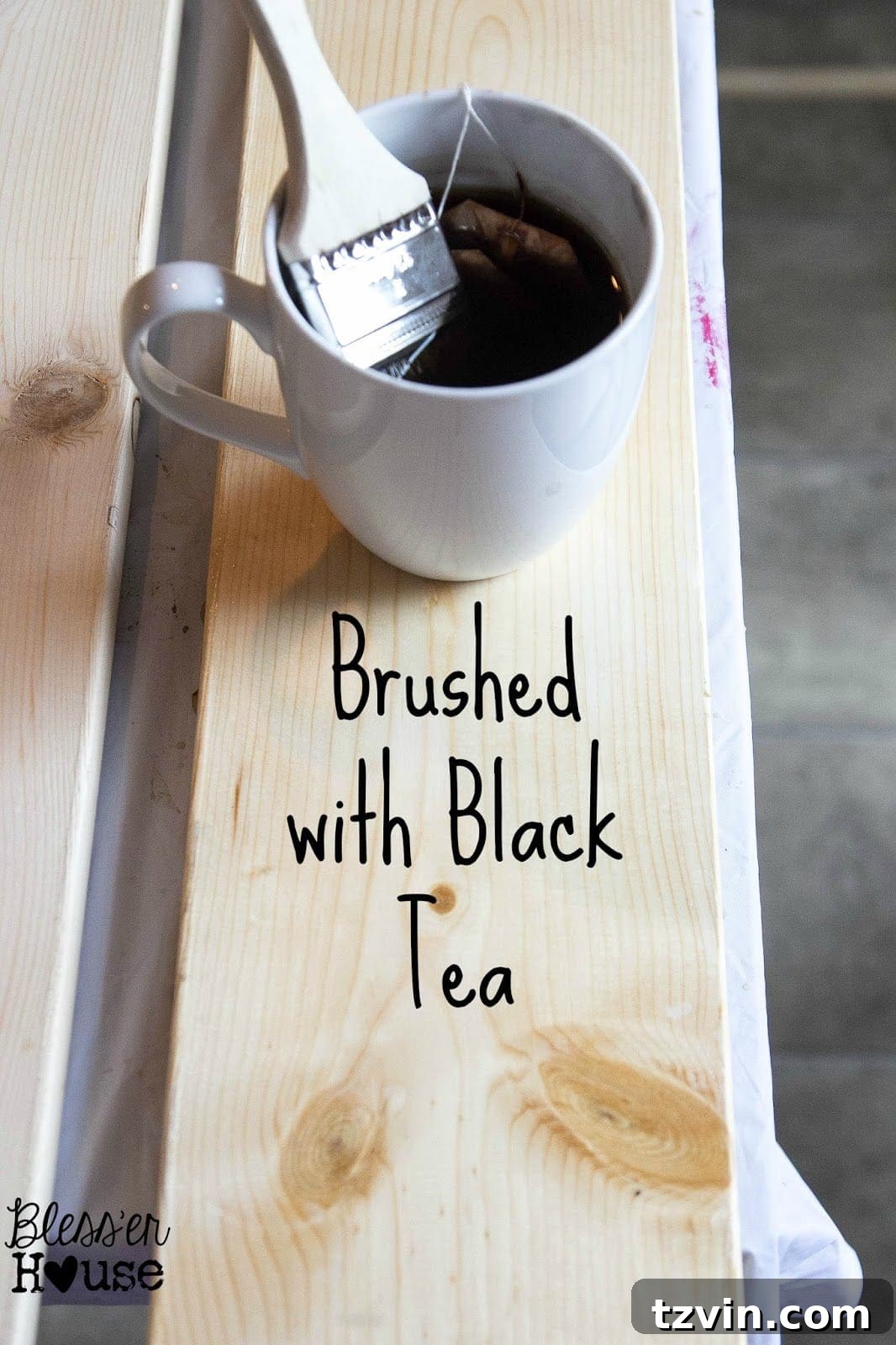 The first step in this all natural wood stain method is to brush the lumber with the black tea, steeped for over 24 hours. 