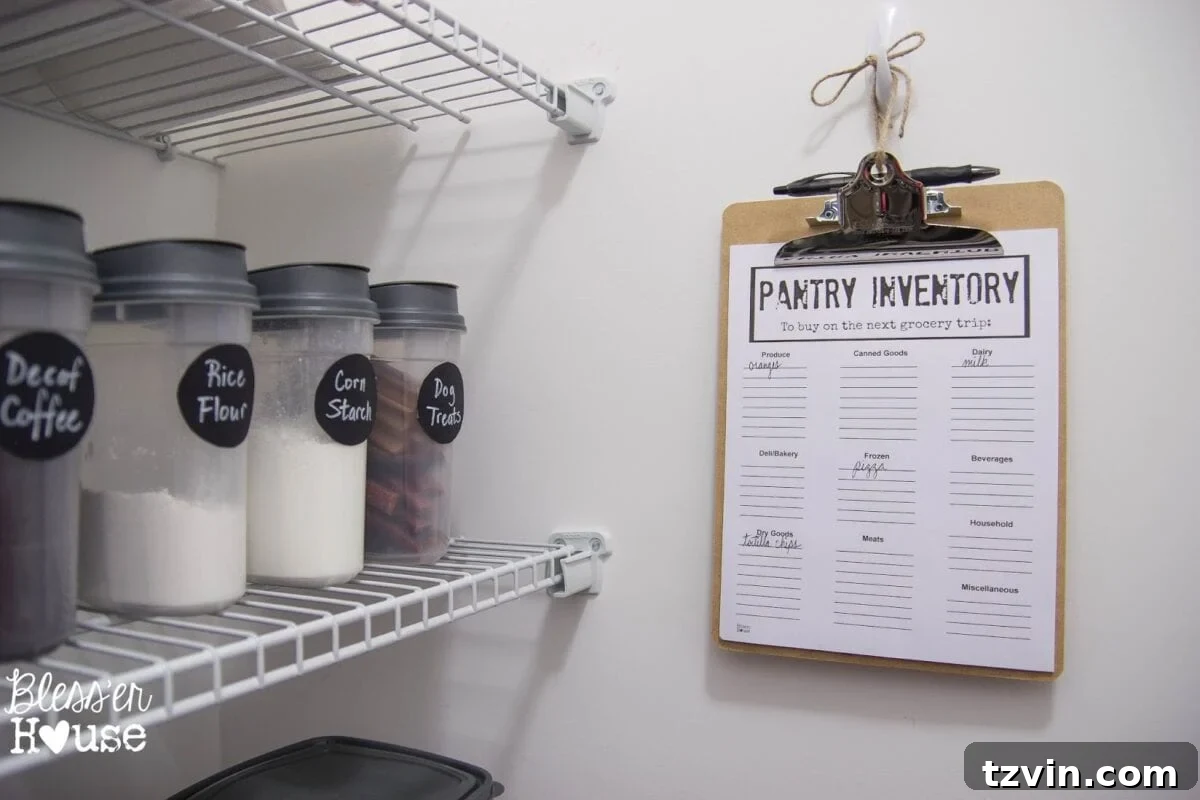 Bless'er House | The Cheapest Way to Organize a Pantry + Free Printable Full view of the organized pantry including the inventory list