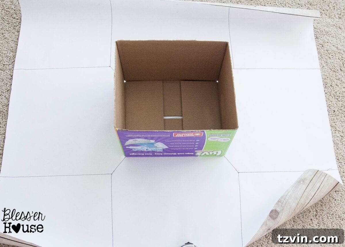 A ruler and marker used to draw guide lines on the white side of the faux wood craft paper for accurate wrapping.