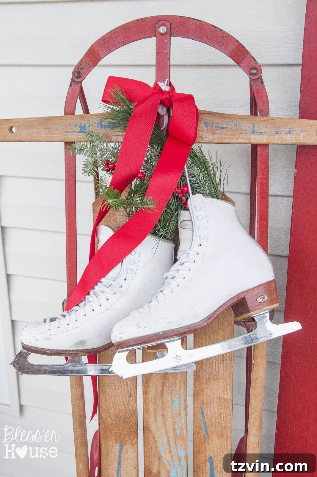 Festive Christmas Decor That Won't Break the Bank 3 Vintage ice skates adorned with ribbon and natural elements, showcasing a thrift store find