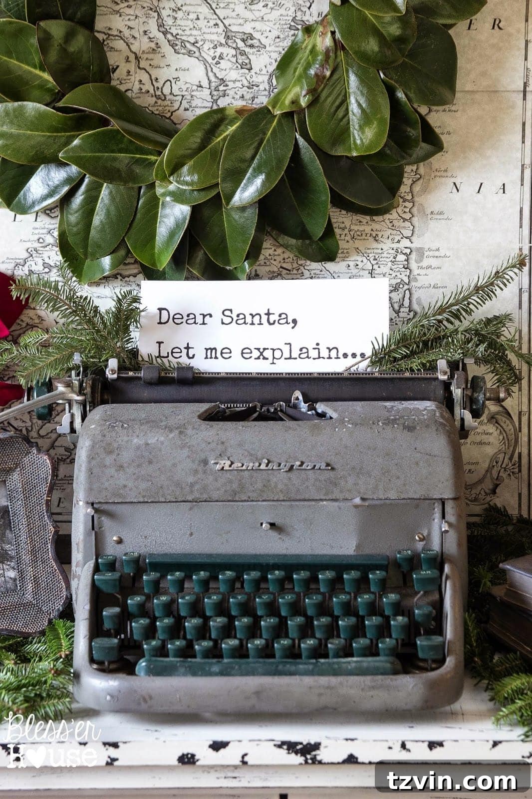 Festive Christmas Decor That Won't Break the Bank 4 A vintage typewriter decorated with a small Christmas wreath, demonstrating how to make everyday items festive