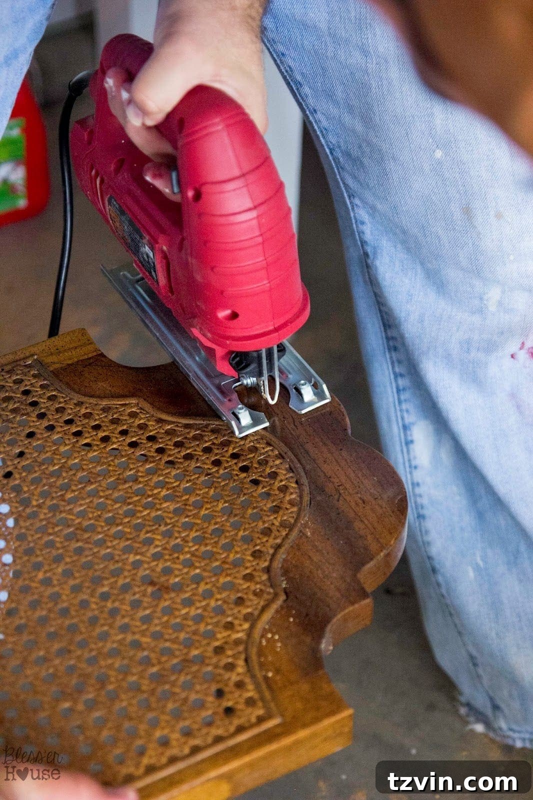 Using a jigsaw to cut the top of the dining chair