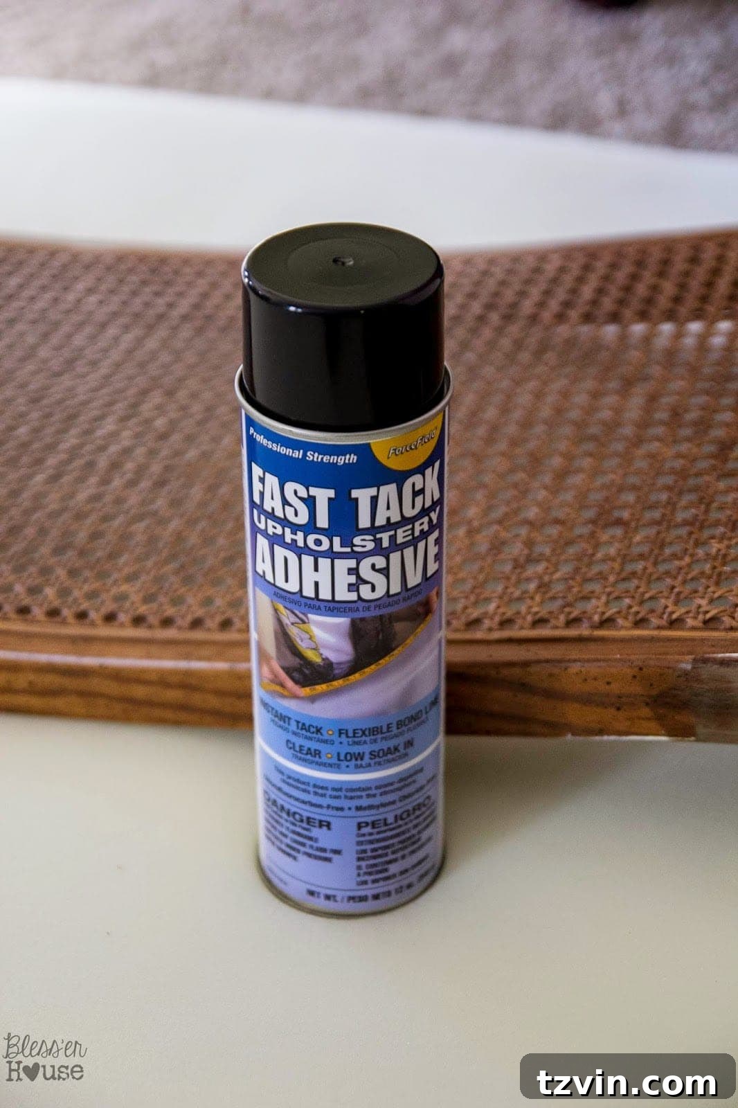 Applying upholstery adhesive to chair back