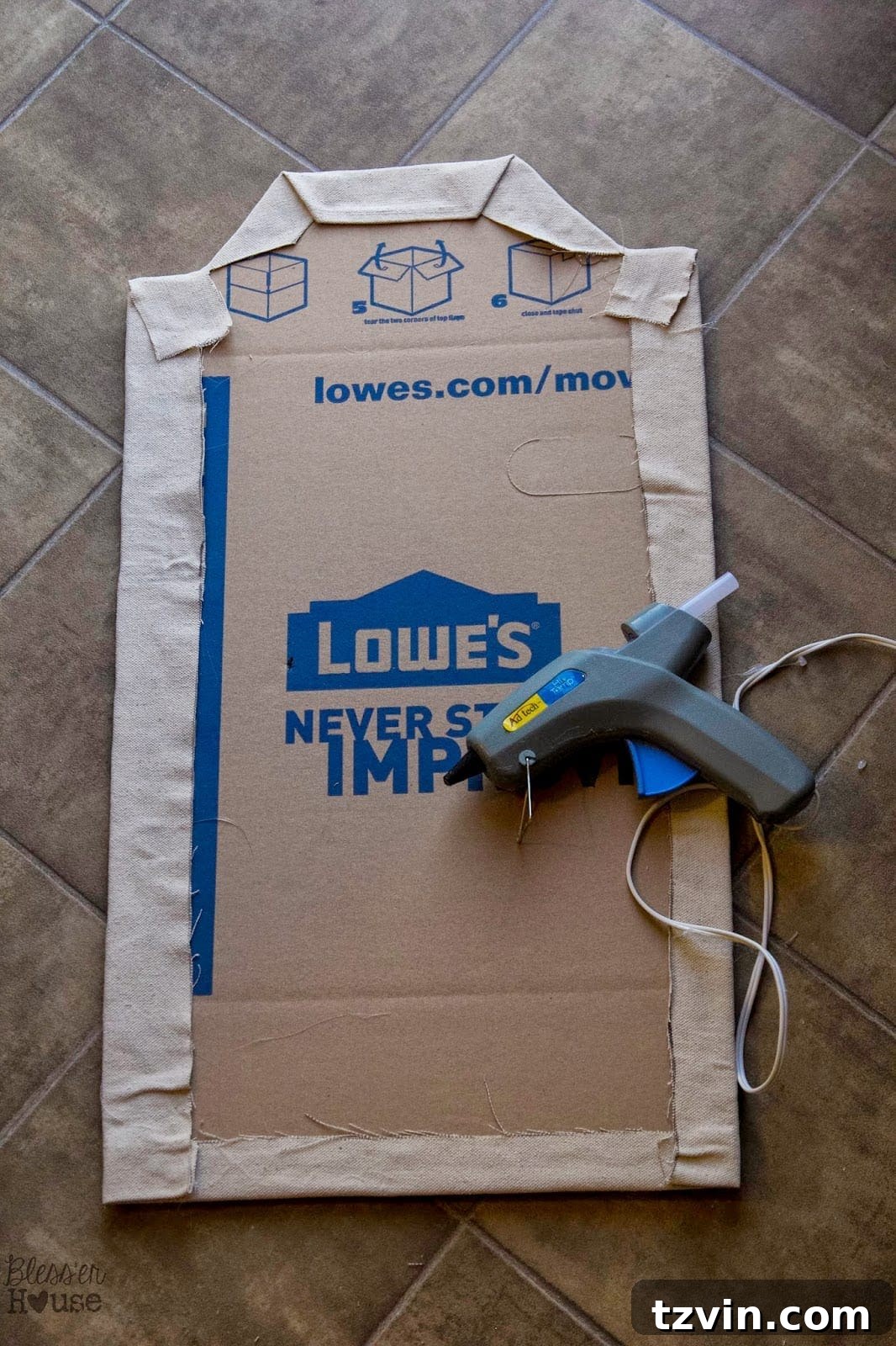 Gluing down fabric corners on the back panel