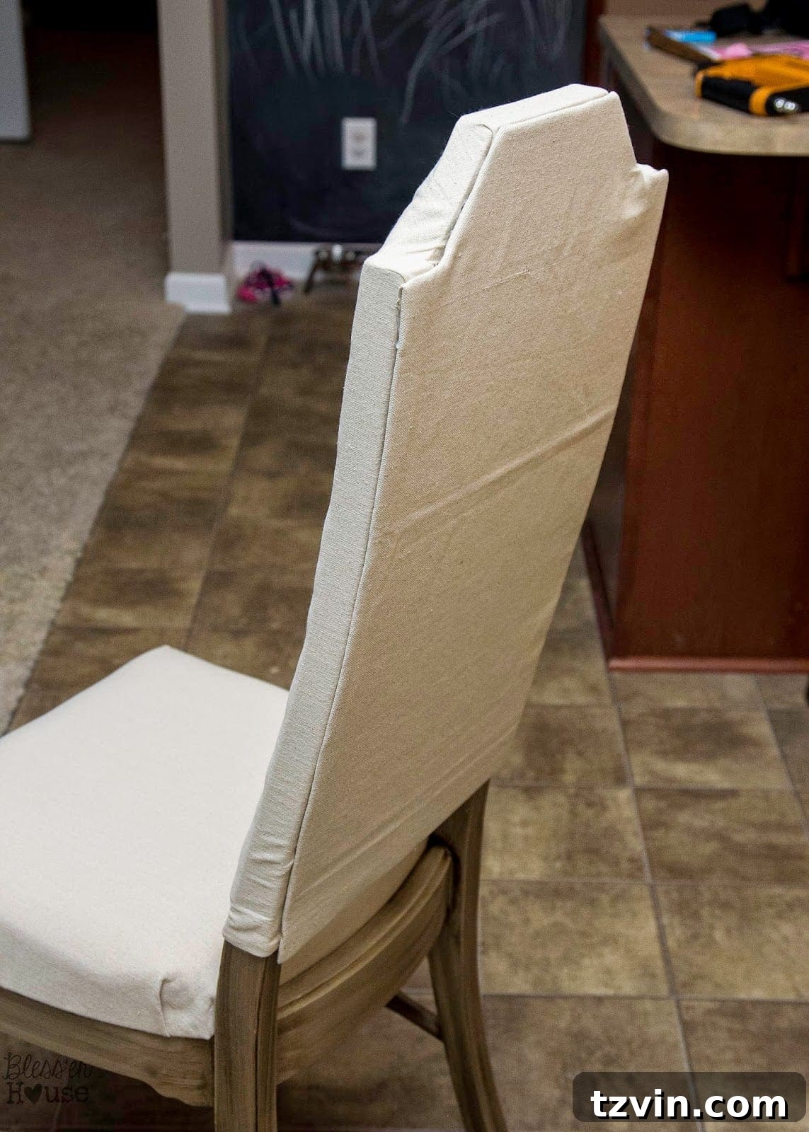Fully upholstered dining chair before nailhead trim