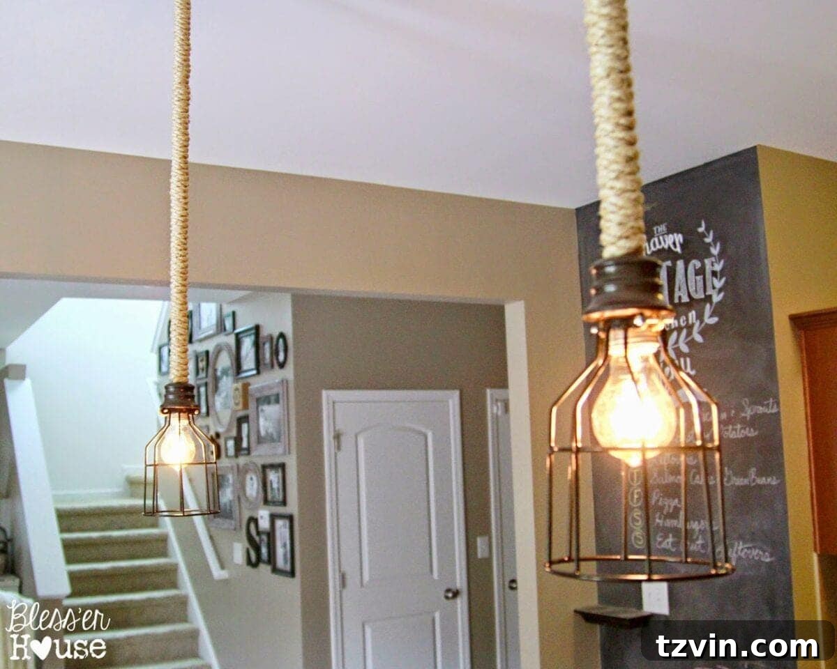 Industrial pendant lights with chalkboard and gallery wall